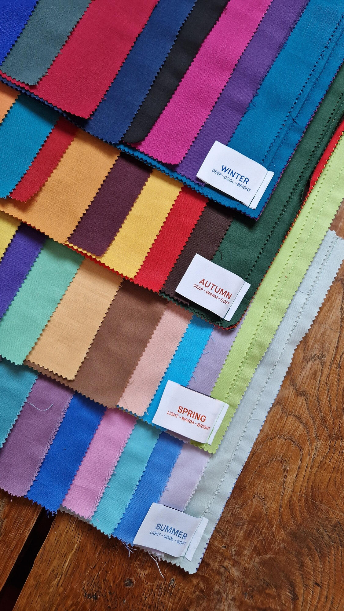 Lyze's colour analysis fabric swatches organised by seasonal palette
